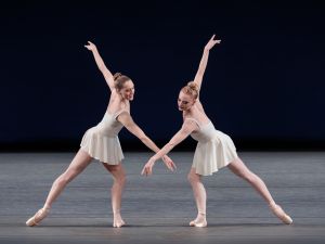 Two ballet dancers perform on a New York stage