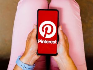 In this photo illustration, the Pinterest logo is displayed