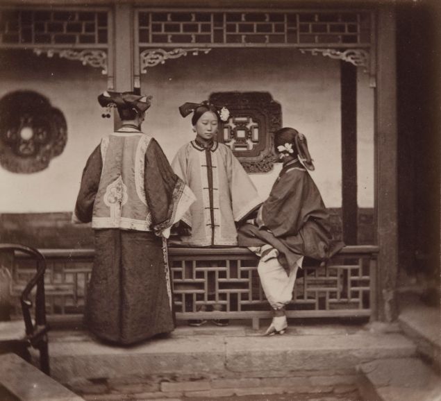 A black and white photo of three Chinese women