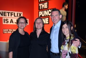 Netflix CFO Spencer Neumann and guests.