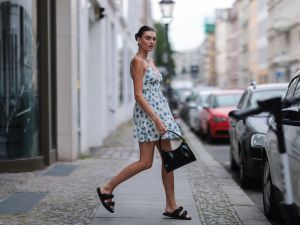BERLIN, GERMANY - JULY 28: Celine Bethmann wearing black Claudie Pierlot sandals, black By Far bag and Zara flower dress on July 28, 2021 in Berlin, Germany. (Photo by Jeremy Moeller/Getty Images)
