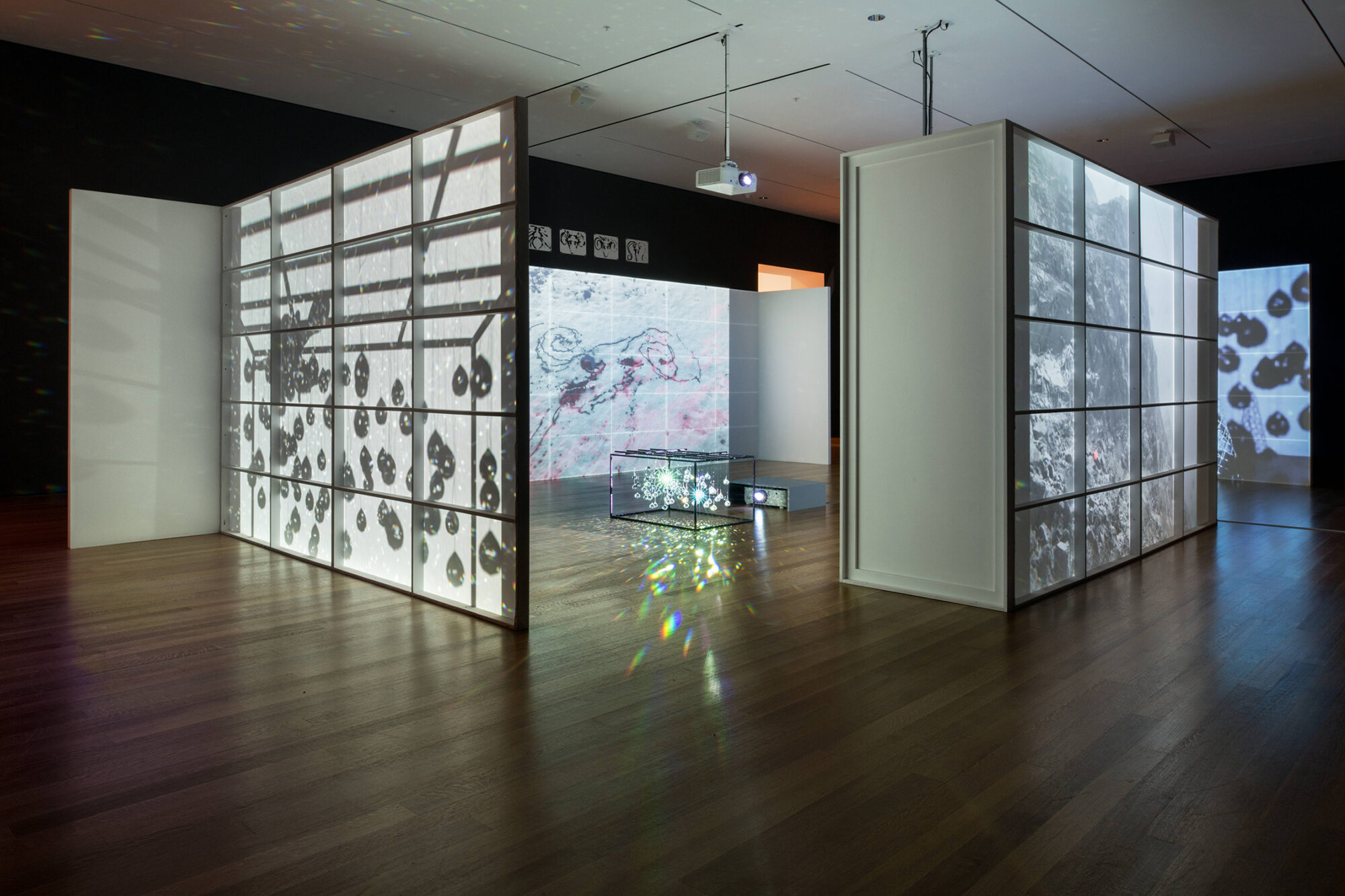 An art installation with Japanese screens, video projectors and crystals