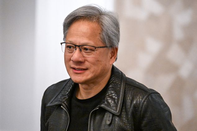 Man in black leather jacket and glasses