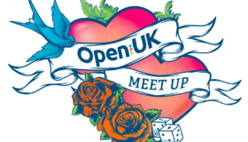 OpenUK Meetup logo. Heart in a tattoo style with a banner across it reading OpenUK Meetup