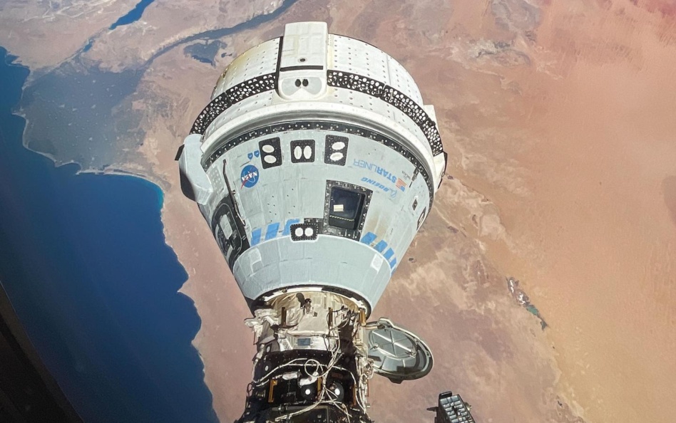 Starliner seen docked at the ISS as it passes high over the Mediterranean. Image: NASA