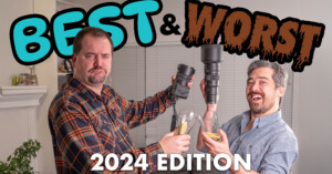 Two men holding camera lenses and beverages, smiling in a living room. The words "Best & Worst" and "2024 Edition" are displayed in bold letters above them. One wears a plaid shirt, the other a denim shirt.