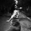 Defocused photo of woman running on the street