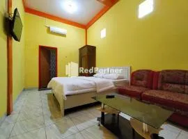 Hotel Hing Amimah Mitra RedDoorz, хотел в Baubau