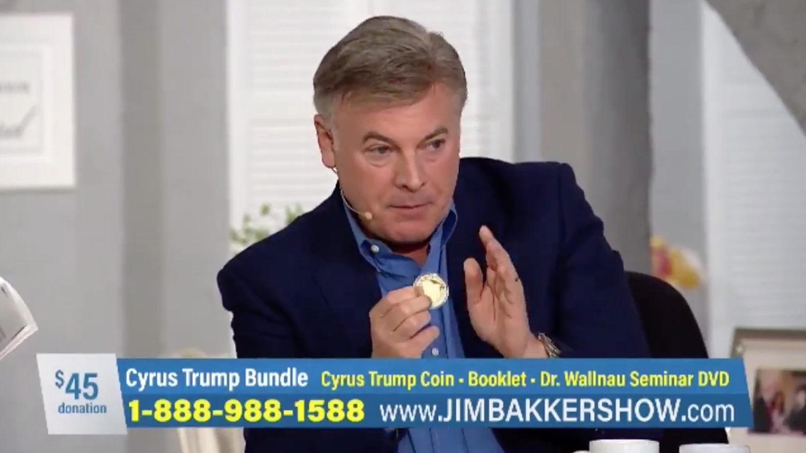 Televangelist Lance Wallnau explains the significance of a gold coin featuring King Cyrus and President Trump on the Jim Bakker Show in May 2019. (Video screen grab)