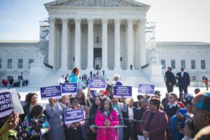 Fearless Fund CEO Arian Simone, center, speaks March 14 outside the U.S. Supreme Court. She co-founded the fund in 2018 to address the chasm in venture capital for start-ups run by women of color. (Tom Brenner for The Washington Post)