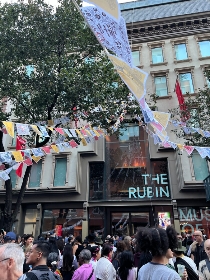 Prayer flags co-created by artists and Rubin Museum visitors hanging outside of the Rubin Museum of Art in New York City