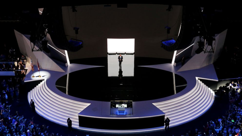 Presumptive Republican presidential nominee Donald Trump walks on stage to introduce his wife Melania on the first night of the Republican National Convention, July 18, 2016 in Cleveland, Ohio.