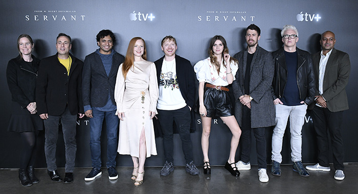 NEW YORK, NEW YORK - OCTOBER 03: R-L) M. Night Shyamalan, Lauren Ambrose, Rupert Grint, Nell Tiger Free, Toby Kebbell, Tony Basgallop and Ashwin Rajan attend Servant Panel during New York Comic Con at Hammerstein Ballroom on October 03, 2019 in New York City. (Photo by Eugene Gologursky/Getty Images for ReedPOP )