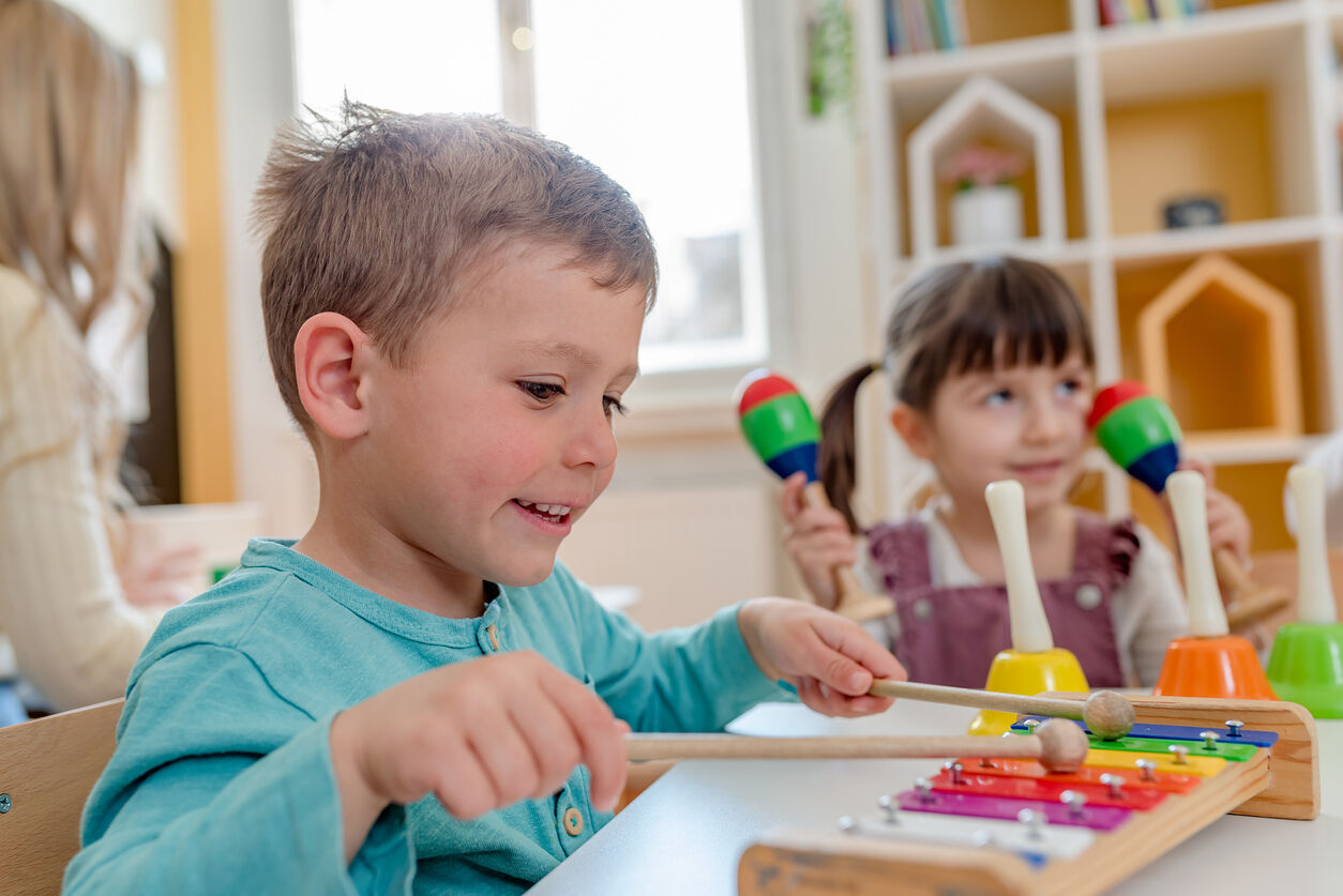 children play music