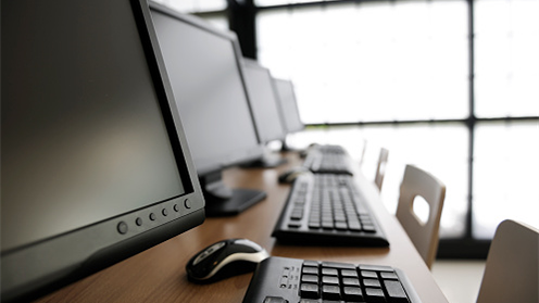 Image of a desktops and keyboards.