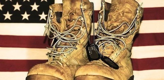 combat boots and American flag