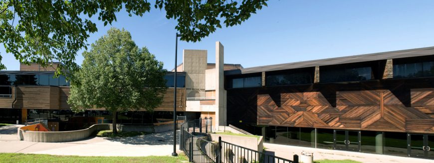 Hodne-Stageberg Partners with Denby Deegan* and Dennis Sun Rhodes*, exterior wooden design at right by George Morrison*, 1972, Minneapolis American Indian Center (photo: Bill Forbes, by permission, all rights reserved)