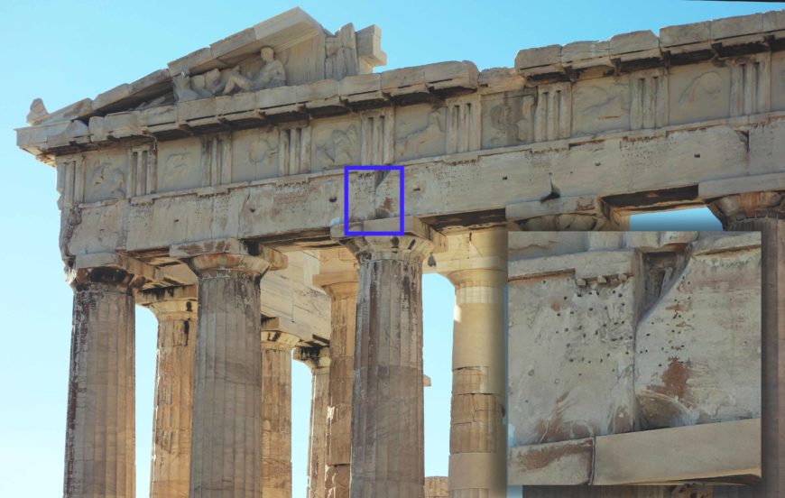 Holes for bronze letters of an inscription honoring the Roman emperor Nero on the east façade of the Parthenon, created and then removed in the 60s C.E. (photo: Steven Zucker, CC BY-NC-SA 2.0)