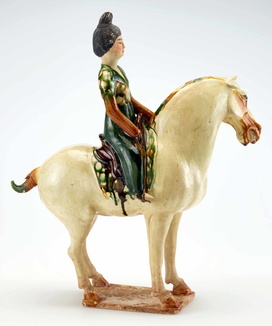 Tomb figure of a woman on horseback, Tang dynasty, ca. 700-750, Earthenware with lead-silicate glazes and painted details, China, Henan province, Possibly Luoyang, 43.1 high x 14.8 x 37.6 cm (Freer Gallery of Art, Smithsonian, Washington, DC: Purchase — Charles Lang Freer Endowment, F1952.13)