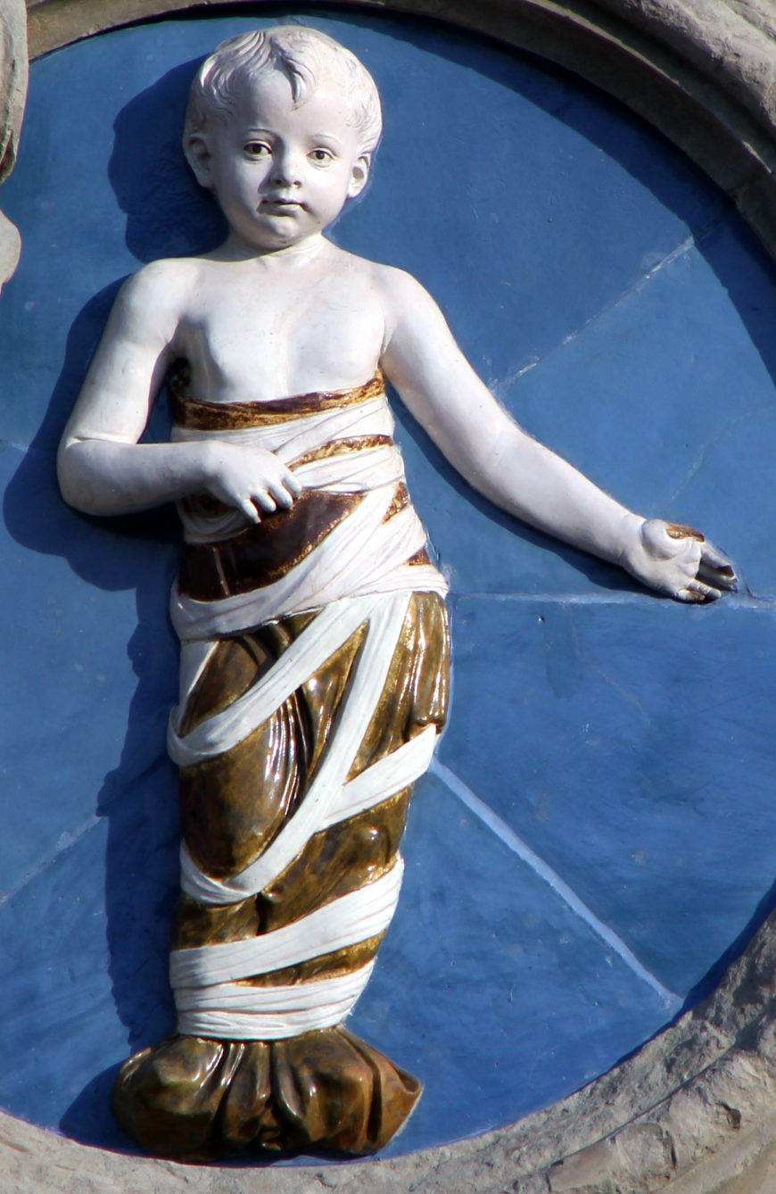 Andrea della Robbia, Infant in Swaddling Clothes, 1487, glazed terracotta, diameter about 100 cm. Ospedale degli Innocenti, Florence (photo: Rachel Boyd)