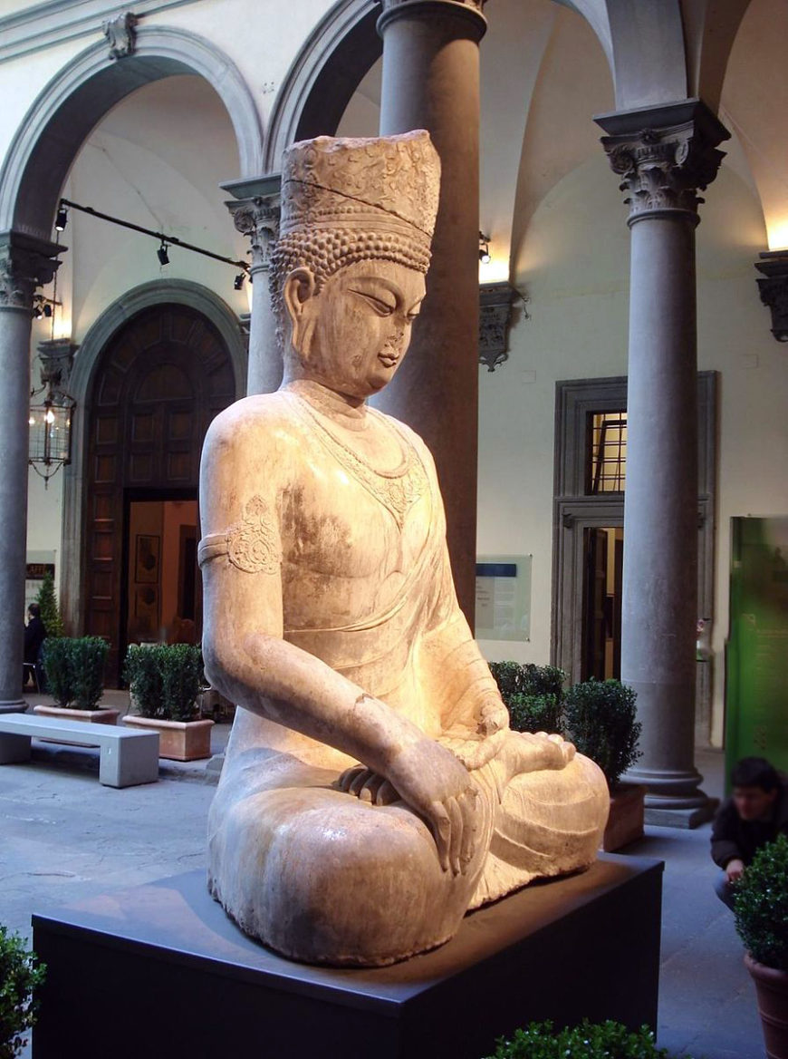 Statue of Vairocana Buddha, originally located in the grottoes of Longmen, carved in the likeness of Empress Wu Zetian during her reign. Photo taken at the exhibition "China at the Court of the Emperors: Unknown Masterpieces from Han Tradition to Tang Elegance (25-907)" at the Palazzo Strozzi in 2008 by Wiki Commons user Harlock81.