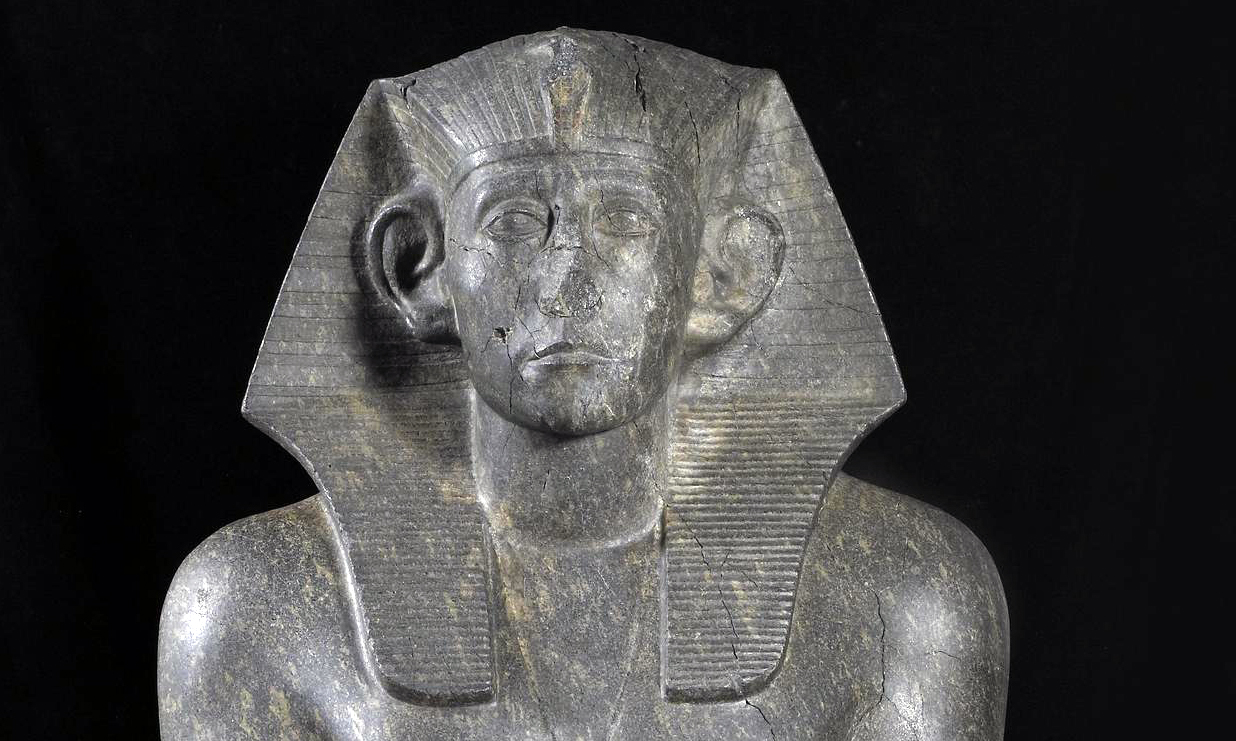 Statue of Senwosret III (Senusret III), 1874–1855 B.C.E., 12th Dynasty, ancient Egypt, incised granite, found at the Temple of Mentuhotep, 122 cm high (© The Trustees of the British Museum, London)