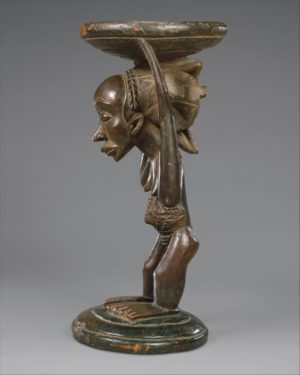 Buli Master, possibly Ngongo ya Chintu, Prestige Stool: Female Caryatid, 19th century, Luba or Hemba peoples, Buli village, Democratic Republic of the Congo, wood, metal studs, 61 cm high (The Metropolitan Museum of Art)