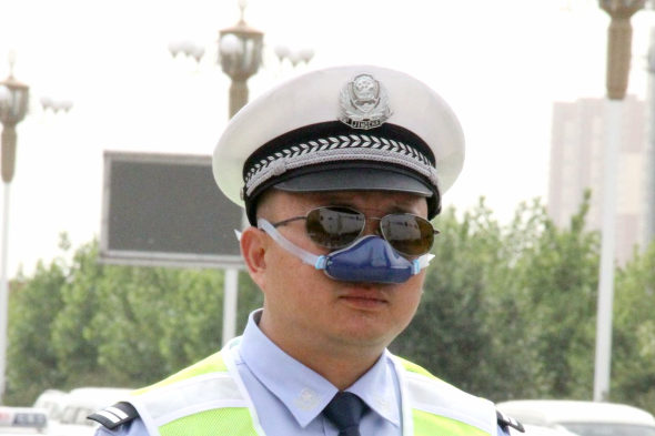 What’s the deal with these new nose gadgets Chinese policemen are wearing?