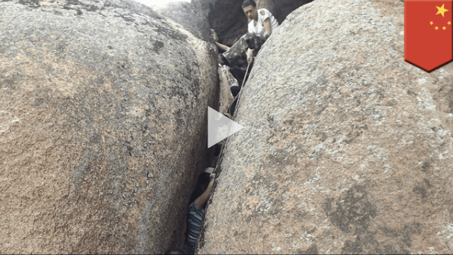 Real life 127 hours? Chinese woman gets stuck between giant rocks【TomoNews Video】