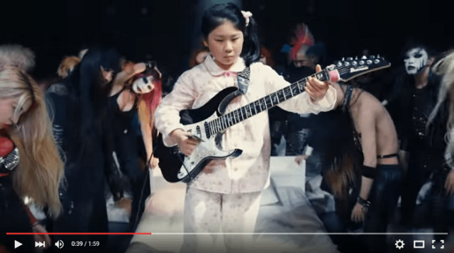 11-year-old guitarist Li-sa-X appears in new commercial, rocks out using a debit card as a pick