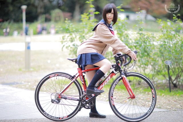 Japanese cosplayer dresses as female high school student for new road bike campaign