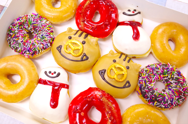 Krispy Kreme puts up a New Year’s line of donuts and we’re ready to scarf them down