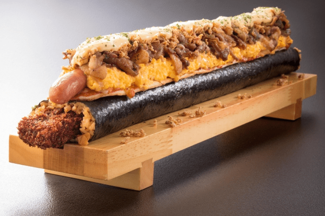 Japan’s crazy 6,000-calorie sushi roll includes a pizza as a topping