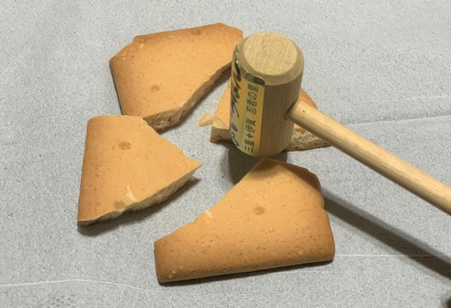 We smash up some rock-hard rice crackers with a hammer to find out which one is the toughest