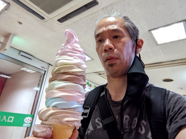 How has inflation affected the price of a gigantic ice cream cone in Tokyo over 10 years?