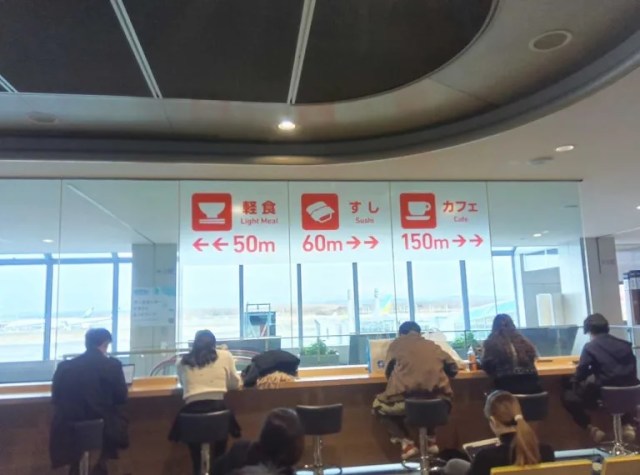 Japan’s New Chitose Airport has the most useful signage for travelers ever: “Sushi, 60 meters”