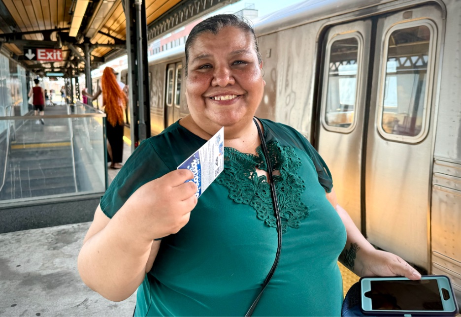 A woman on a New York subway platform.