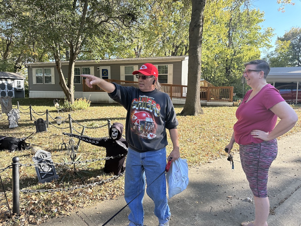 Mobile home park residents show off Halloween decorations.