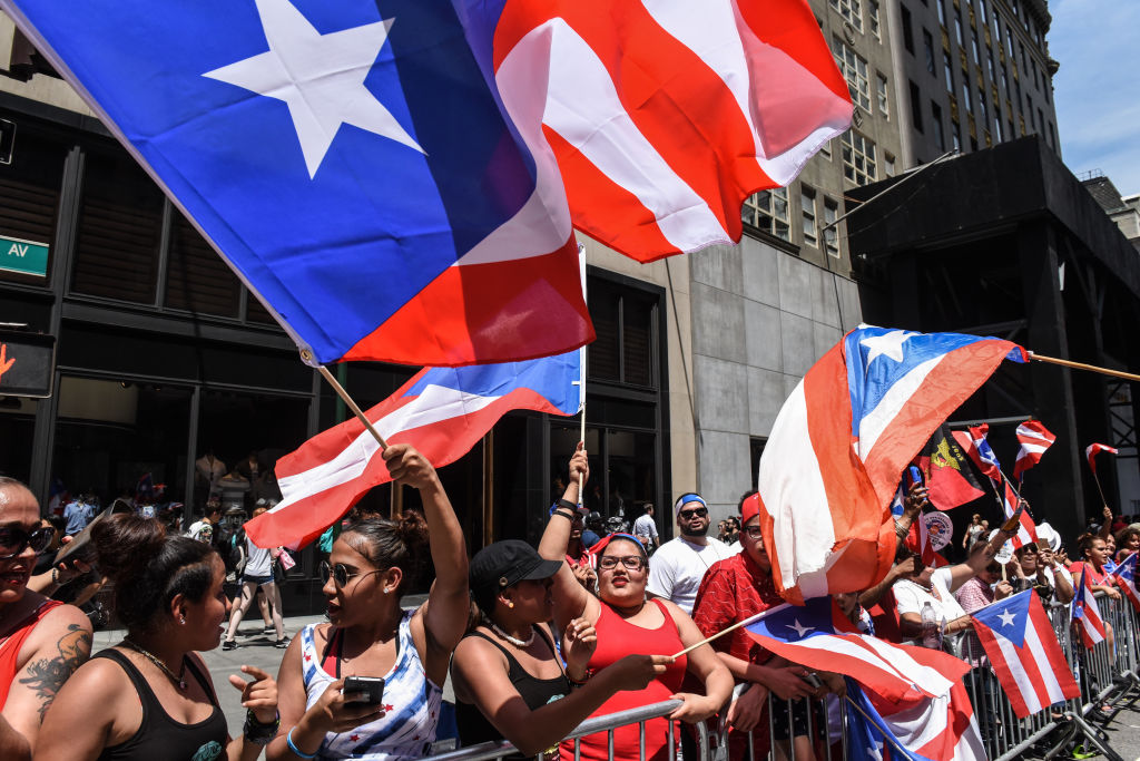 People participate in a parade.