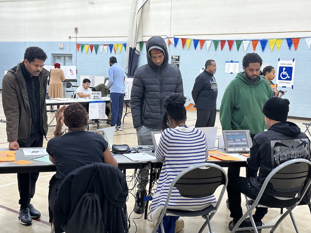 Voters sign in at a polling place in Maryland.