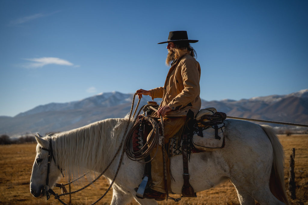 A man rides a horse.