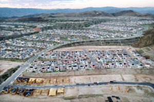 A new row of homes is under construction in a Santa Clarita, Calif.