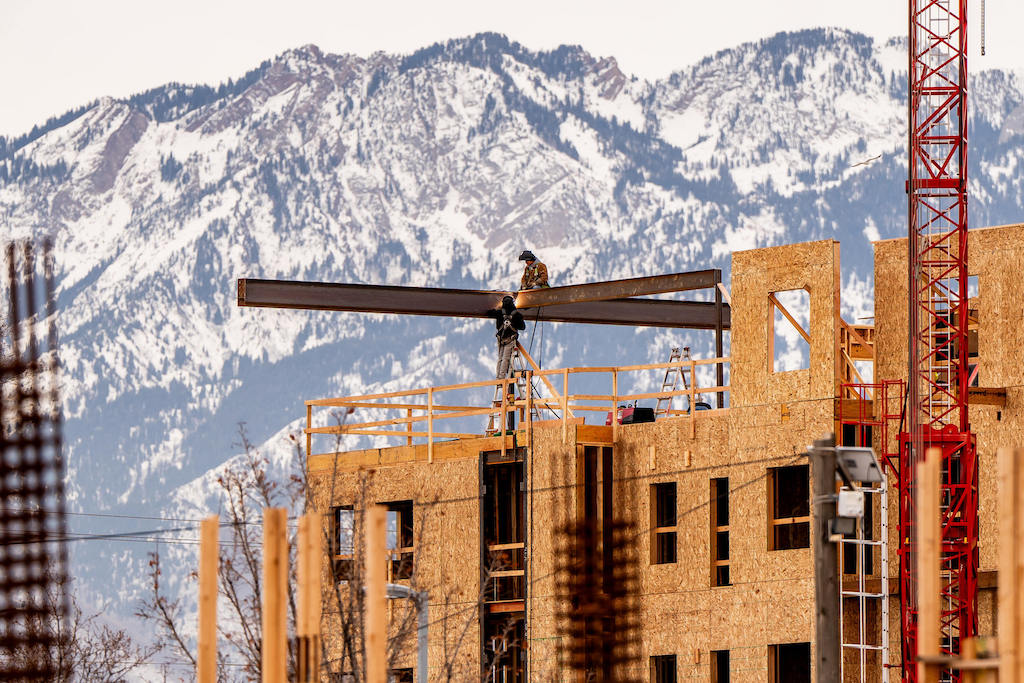 Construction crews work on new apartments in Salt Lake City.