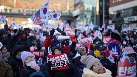 Supporters of impeached South Korean President Yoon Suk Yeol stage a rally in Seoul, South Korea, Friday, Jan. 3, 2025. 