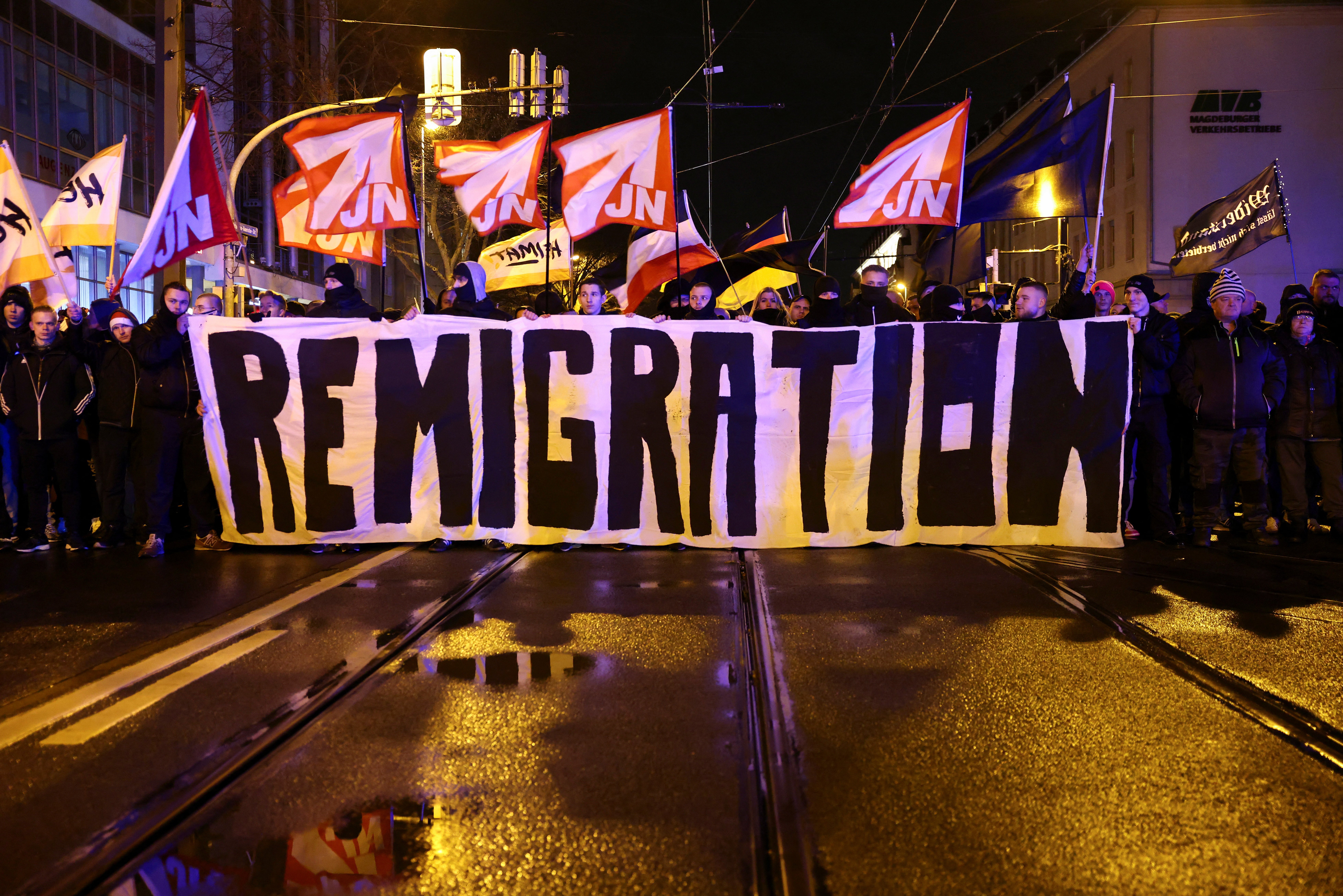 Far-right demonstrators take part in a protest on Saturday after a car drove into a crowd at a Christmas market in Magdeburg, Germany