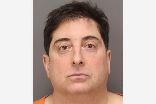 <p>Lee Jonathan Farber was arrested after ‘forcibly’ removing the pro-Trump signs from his neighbor’s fence in Florida</p>