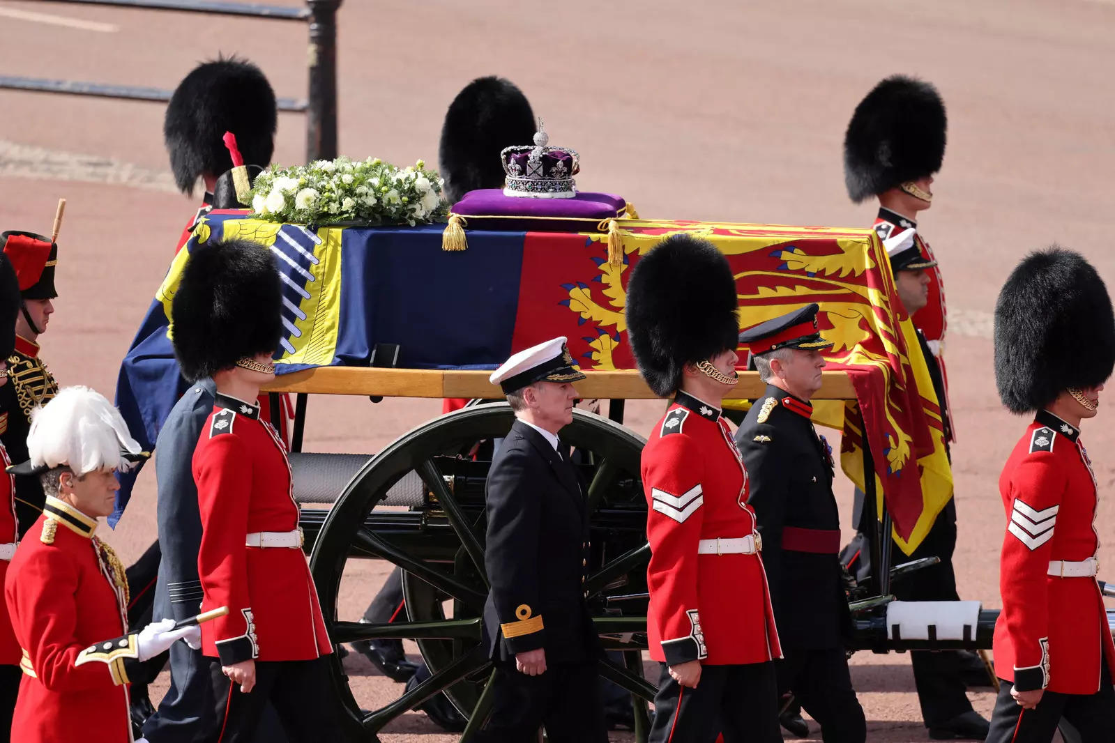 Queen Elizabeth II's coffin procession passes through London; see pics