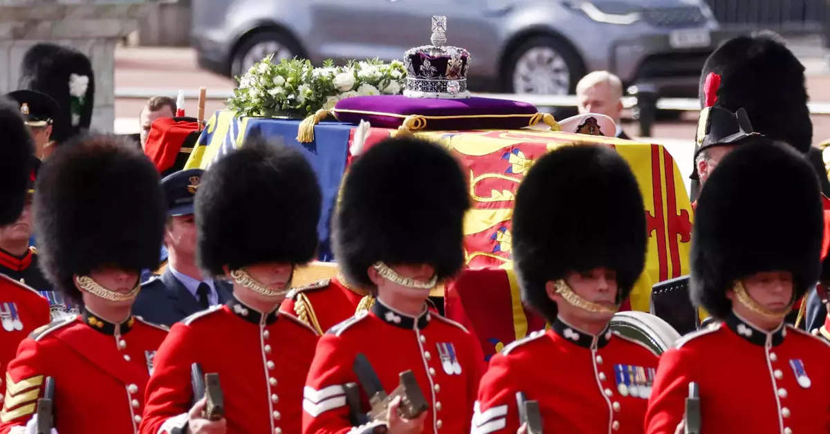 Queen Elizabeth II's coffin procession passes through London; see pics