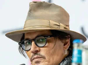 Johnny Depp warns fans about online scammers