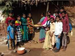 Students feed the hungry on Holi